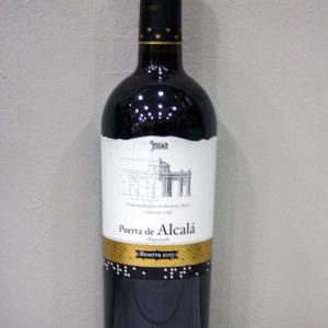 Vino Puerta de Alcala Reserva: es un vino tinto de Reserva 2013 elaborado a partir de la variedad Tempranillo (100%) por Vinos Jeromin, bajo la denominación de origen vinos de Madrid. Vino galardonado con diferentes premios · Floristería Los Santos Niños · Alcalá de Henares · Madrid